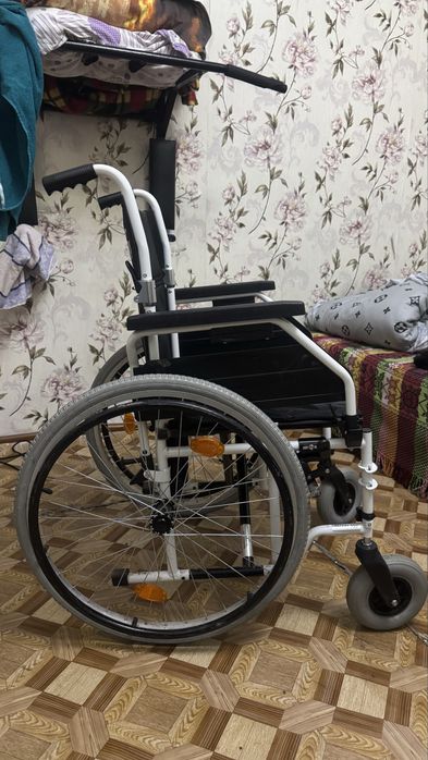 Инвалидная коляска