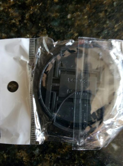 Капачка за фотоапарат 52 мм