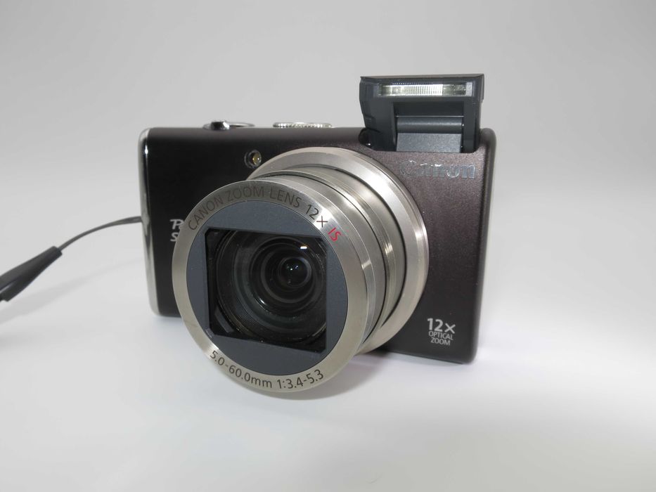 Canon SX200 ултра компактен цифров фотоапарат, дигитална камера с голям оптичен зуум, като НОВА - пълен комплект - работи отлично