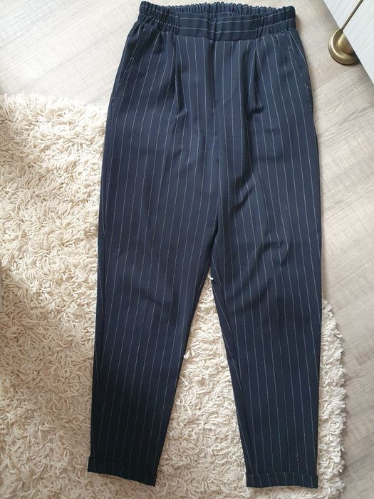 Pantaloni cu dungi