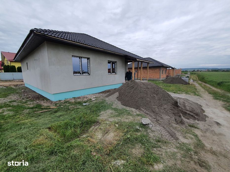 Casă la cheie pe 1 nivel 4 camere 2 băi,145 mp,500 mp teren