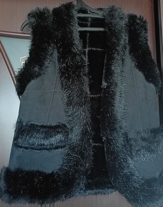 Продам жилет женский