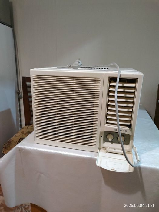 Оконный кондиционер “Midea”