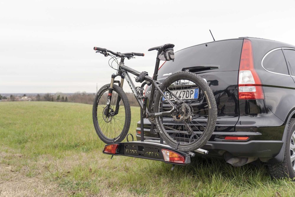 Suport bicicleta pe carlig Merak Rapid, 2 biciclete, maneta, aluminiu