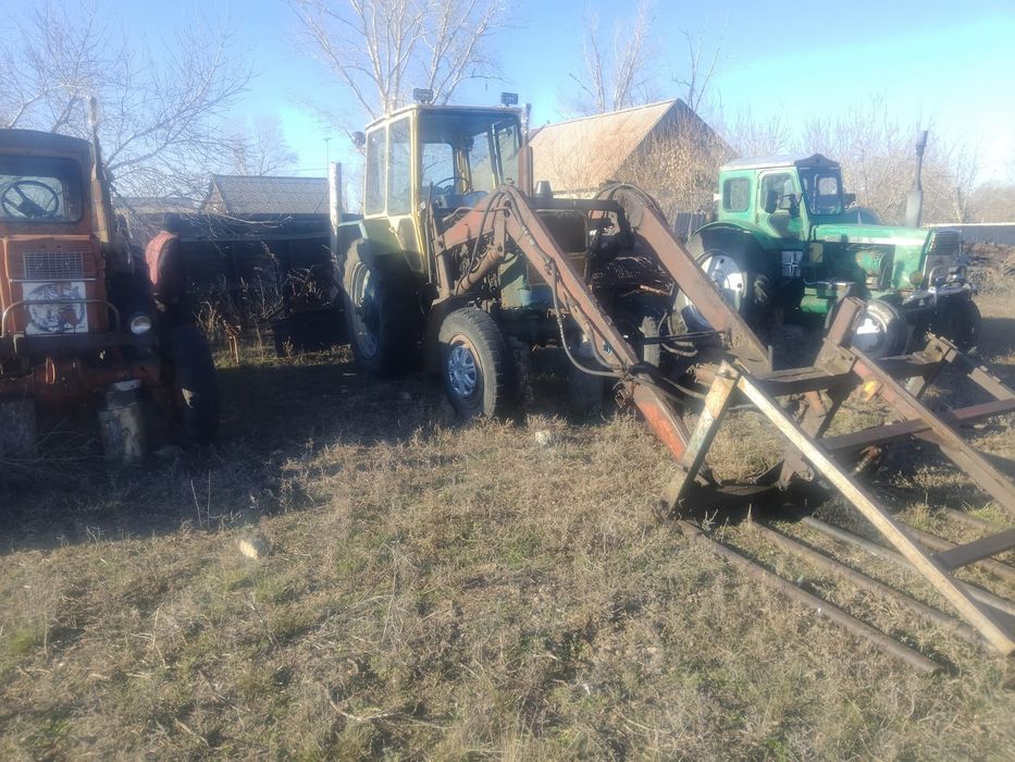 ЮМЗ с куном косилка прицеп.