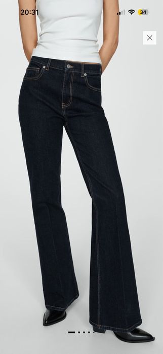 Нави дънки Mango flare и кожен панталон