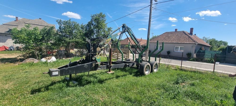 Vând sau schimb remorca forestiera cu macara