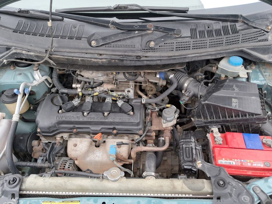 Машина Нисан Альмера тино