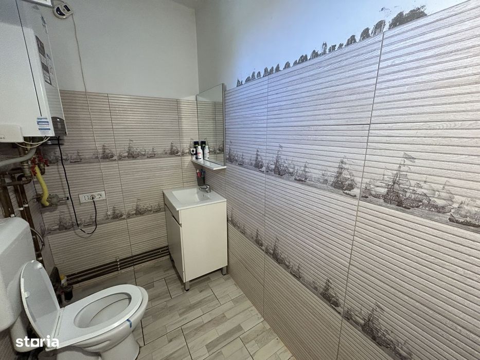 Vand casa din caramida, st.494 mp, sc.131 mp, cu 4 cam.2 bai, moderna