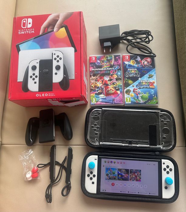 Nintendo Switch OLED alb – pachet complet + jocuri originale