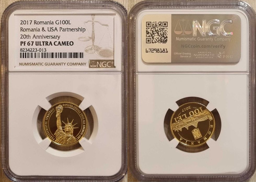 Moneda aur BNR 100 Lei, parteneriat Romania-SUA, gradata NGC PF 67 UC