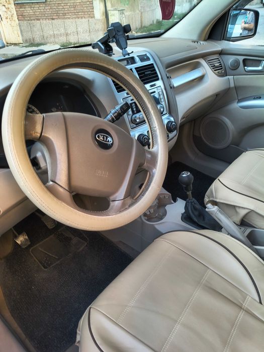 автомобил KiA Sportige