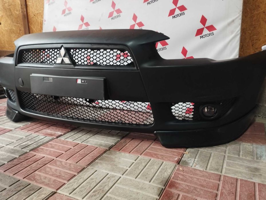 Бампер передний Лансер