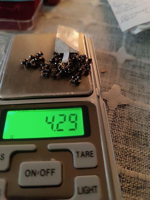 Продам золотую цепочку  с  черными бриллиантами