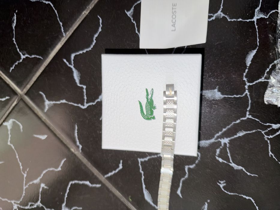 Bratara Lacoste.
