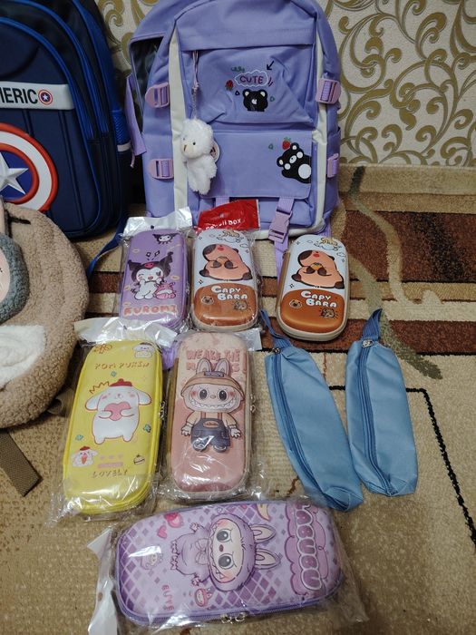 Игрушки и рюкзаки