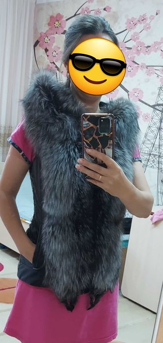 Продам меховую желетку