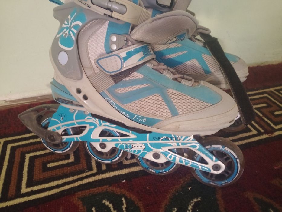 Роликовые коньки