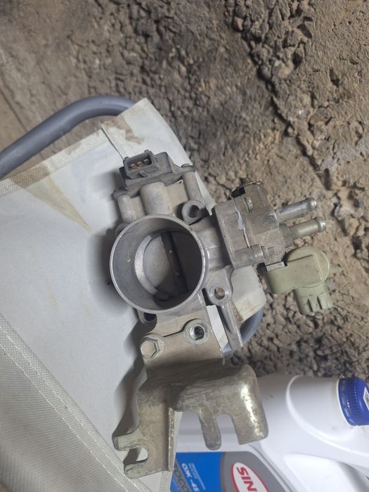 заслонка на карина е 15000