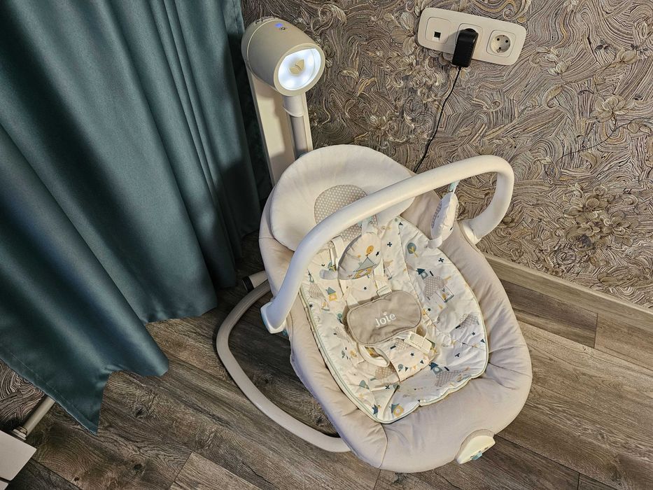 Продам шезлонг фирмы Joie.