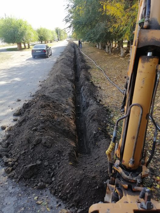 Услуги Экскаватора погрузчика 3в1 в городе Тараз