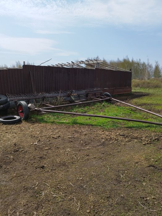 Продам косилку с граблями.