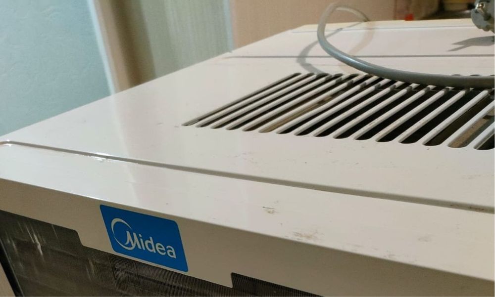 Оконный кондиционер “Midea”