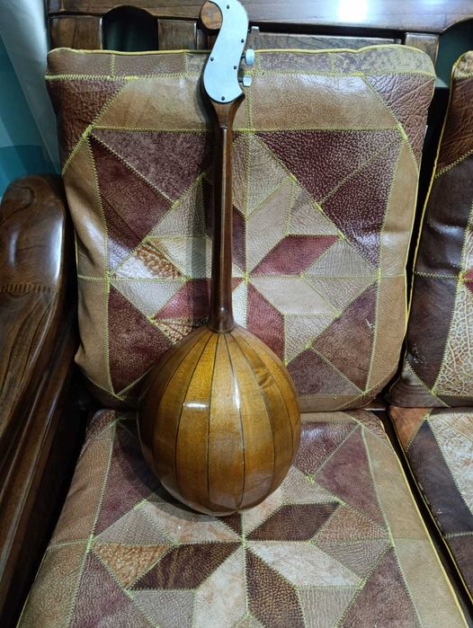 9-клёпочная домра