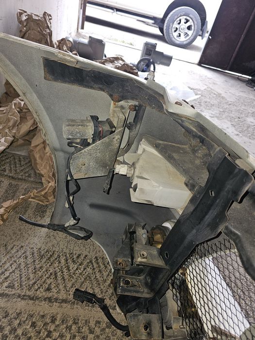 Передний бампер на Mitsubishi Delica