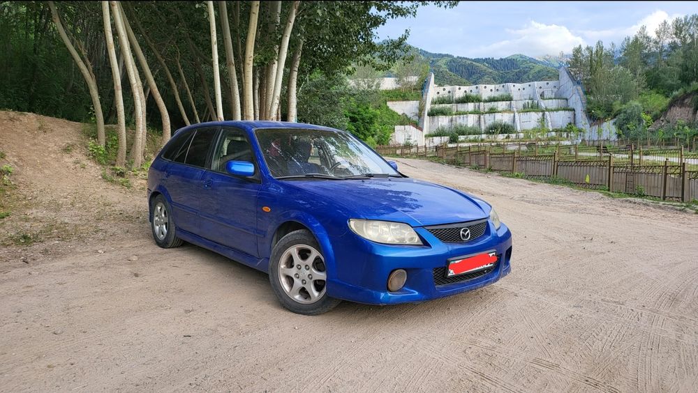 Mazda 323 (Торг)