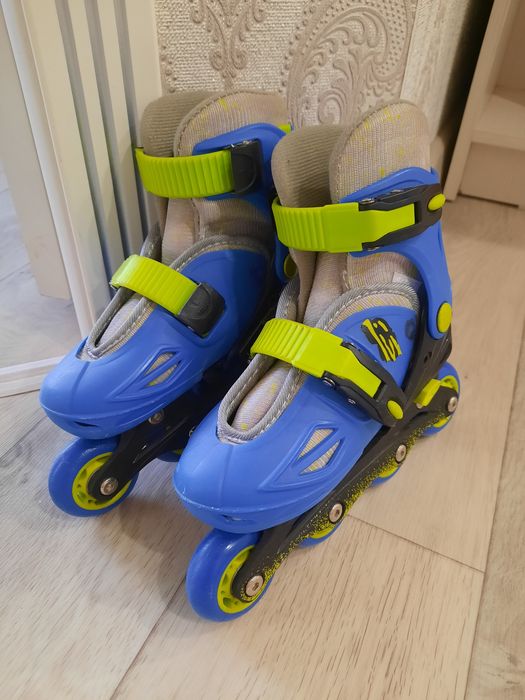 Роликовые коньки новые