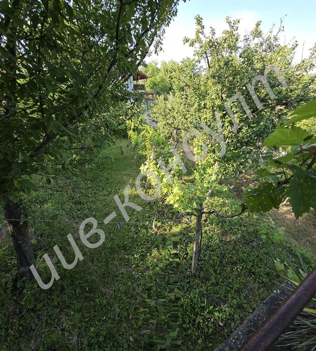 Голям парцел с панорамна гледка и къща в с. Малки Чифлик