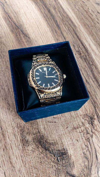 Часы Patek Philippe золотой свет