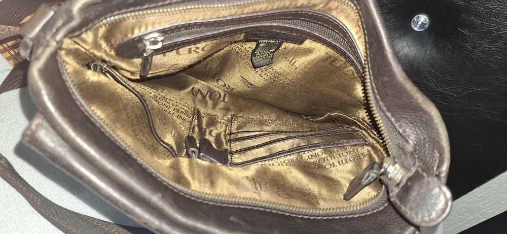 Geantă din piele, Tony Perotti