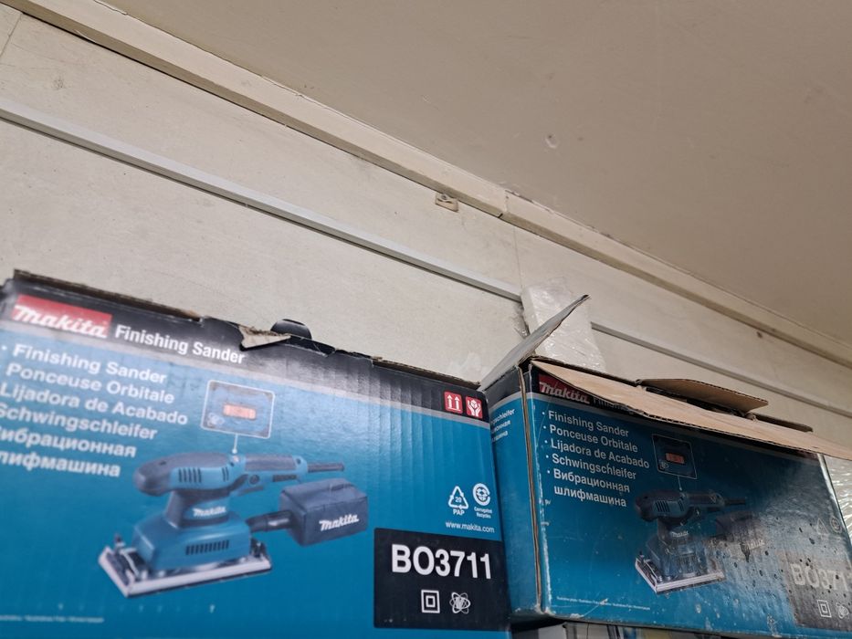 Шлифовальная машинка Макита.