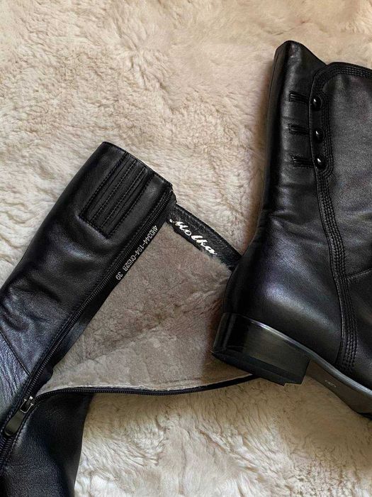 Новые кожаные сапоги