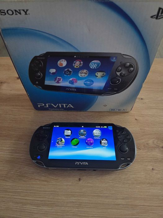 PS Vita Oled modat cu adaptor SD2Vita plus card Sandisk 64gb impecabil