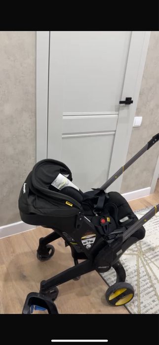 Doona автокресло коляска