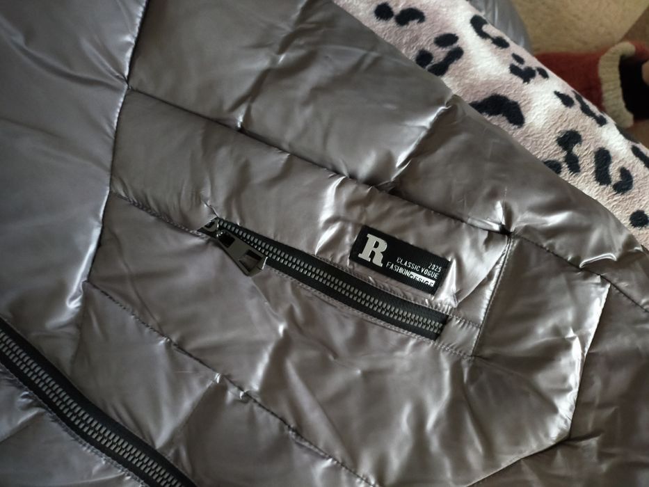 Женский пуховик .