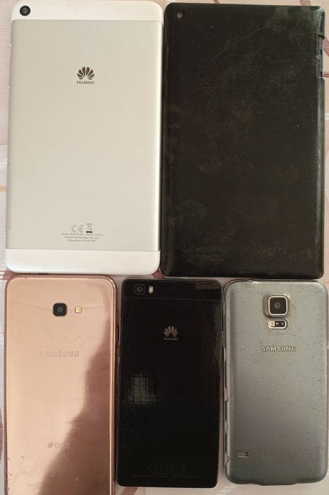 Таблети и телефони за части.