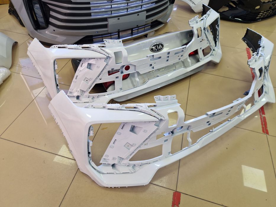 Запчасти бампер GEELY COOLRAY NEW в наличии в цвет