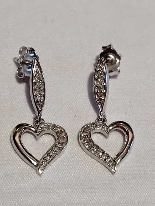 Златни обеци сърца с диаманти