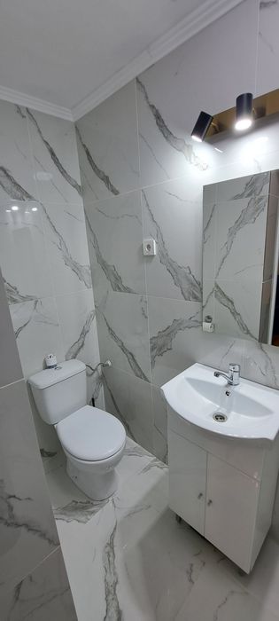 Cazare ultracentral apartament cu dormitor, living, bucatarie.