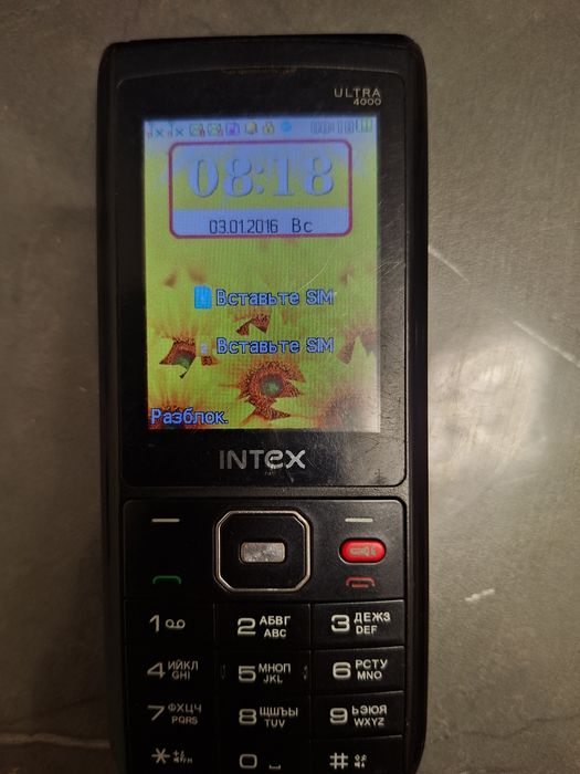 Телефон кнопочный