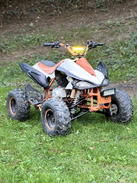 Vând atv de copii de 125 cm automat merge bine trage bine
