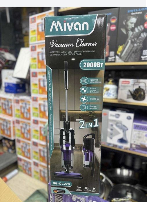 Вертикальный пылесос два в одном ручной.