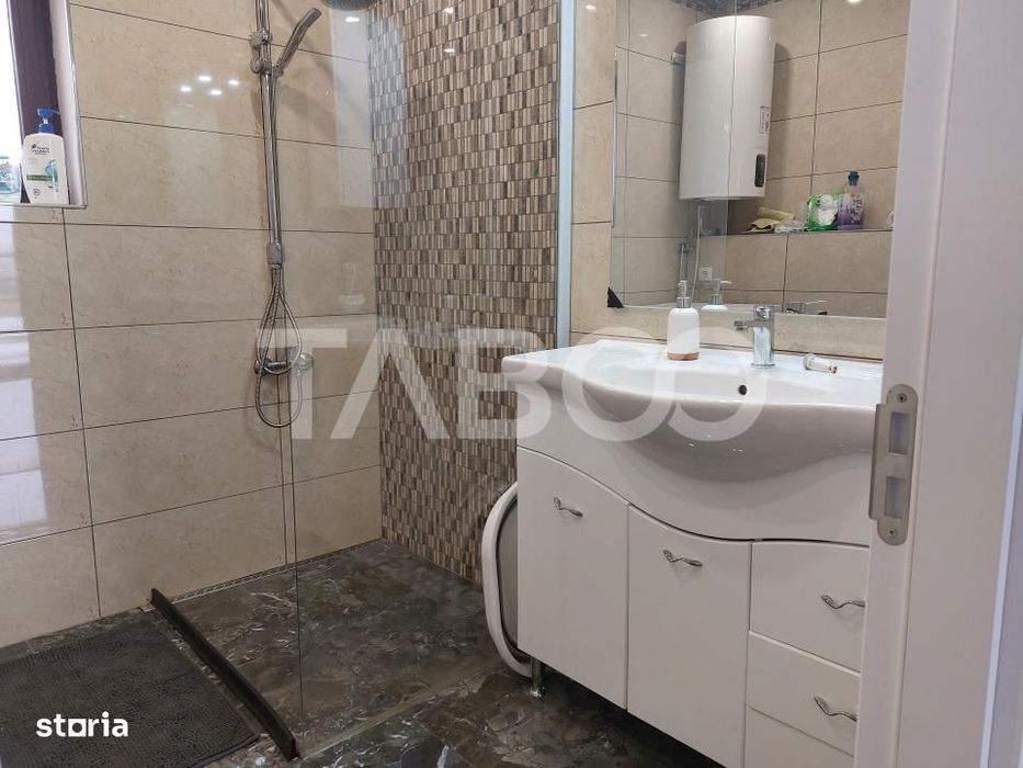 Casa individuala noua 4 camere P+M 144 mpu curte libera 416 Cisnadie