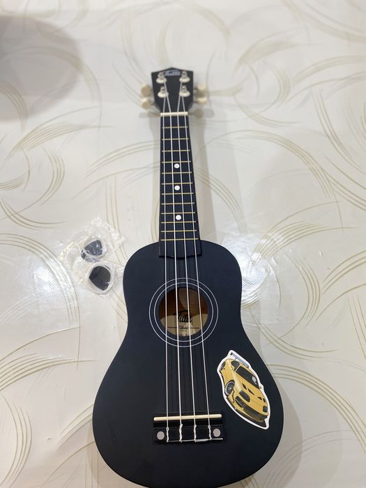 Tutti укулеле сатылады