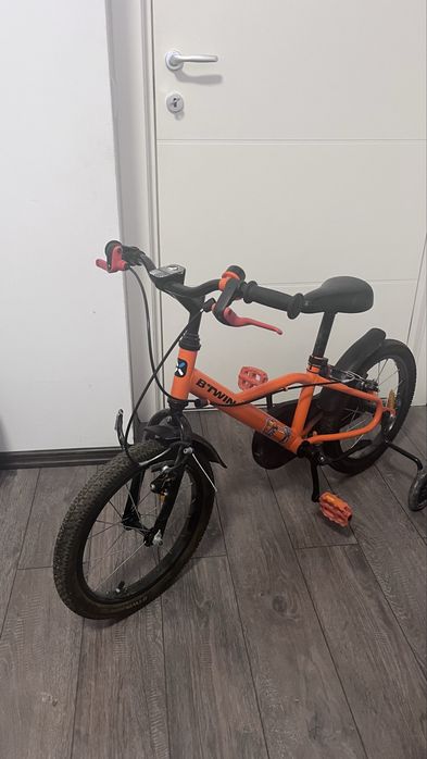 Bicicleta cu roti ajutatoare