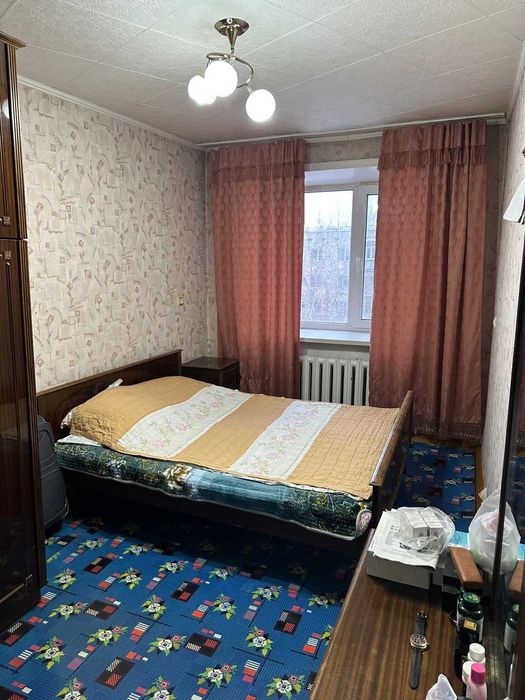 Продам 4 комнатную квартиру